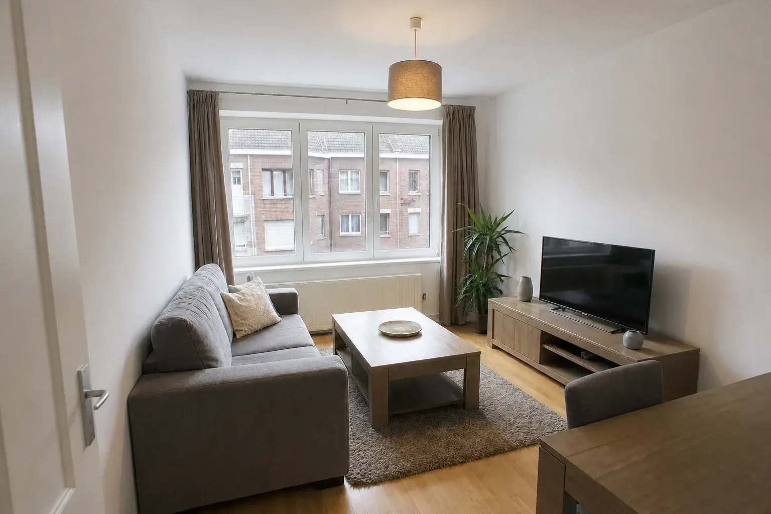 The same living room with balanced, brighter light